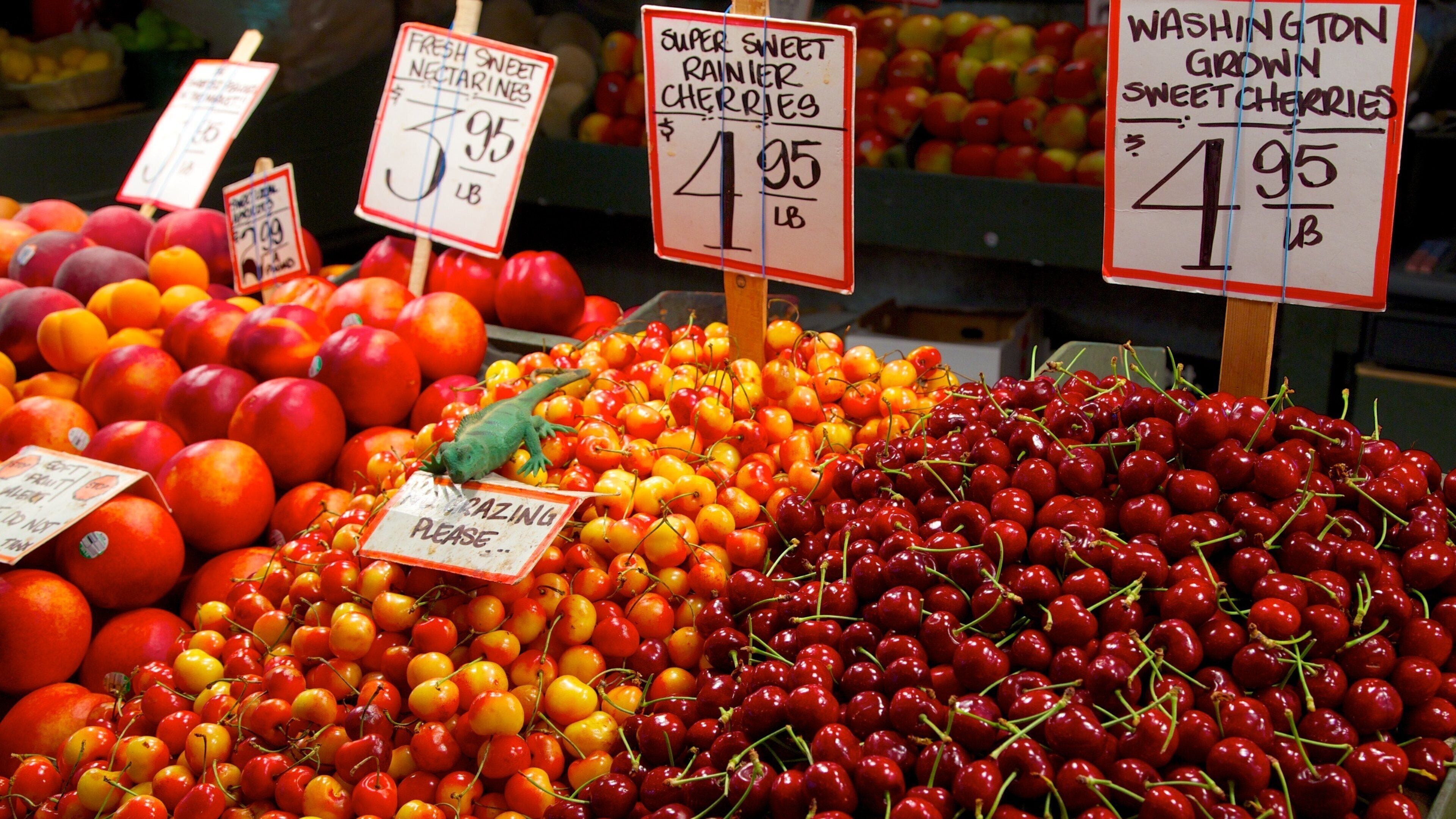 Pike Place Market showing signage, interior views and markets