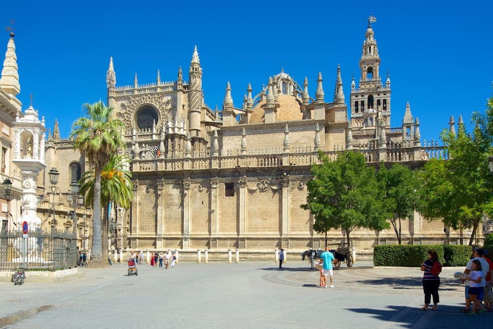 A historic cathedral with intricate architecture and a clear blue sky.