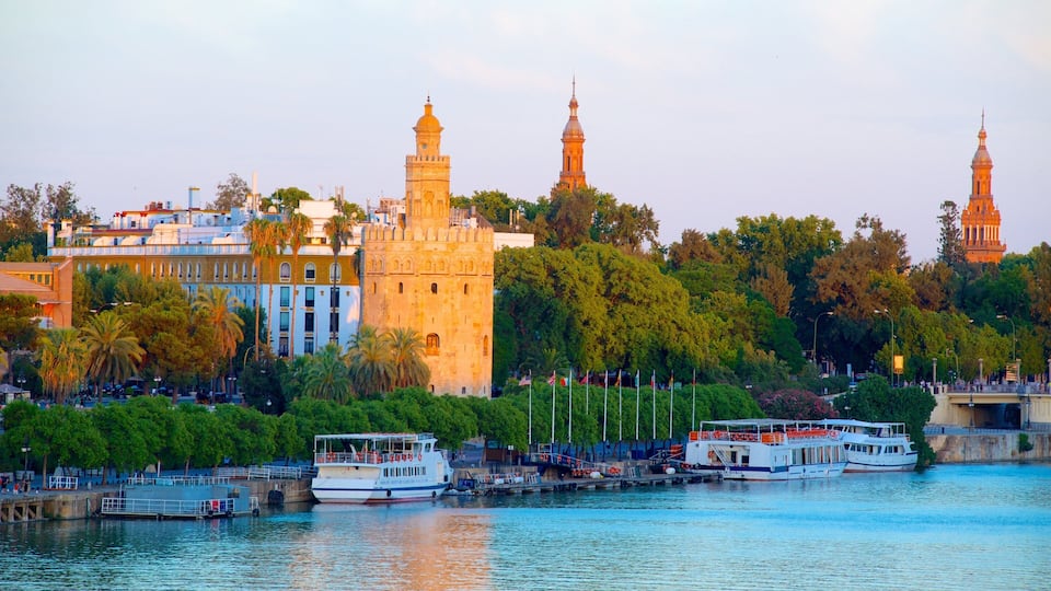 Torre del Oro Watchtower featuring heritage architecture, a river or creek and a bay or harbor