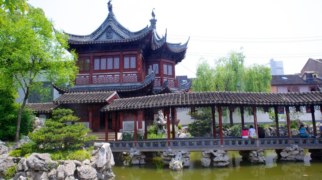 Yu Yuan Garden featuring heritage architecture, a pond and a park