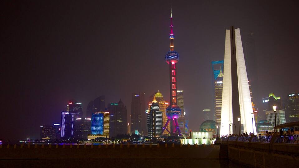 Oriental Pearl Tower showing night scenes and a city