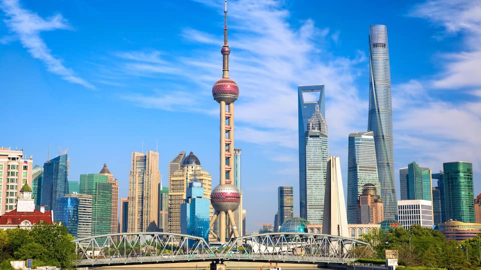 Shanghai skyline with historical Waibaidu bridge, China