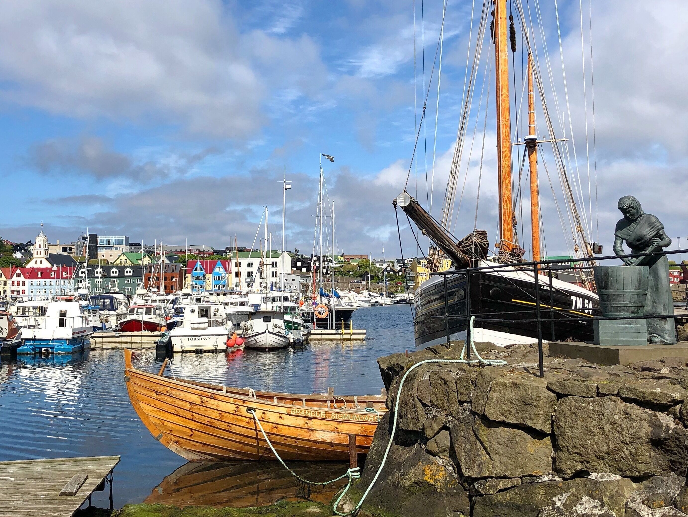 Walking around the marina in Tórshavn, Faroe Islands is a pleasant experience. There are several places to sit and have a coffee/tea or a nice meal while admiring the harbor.
