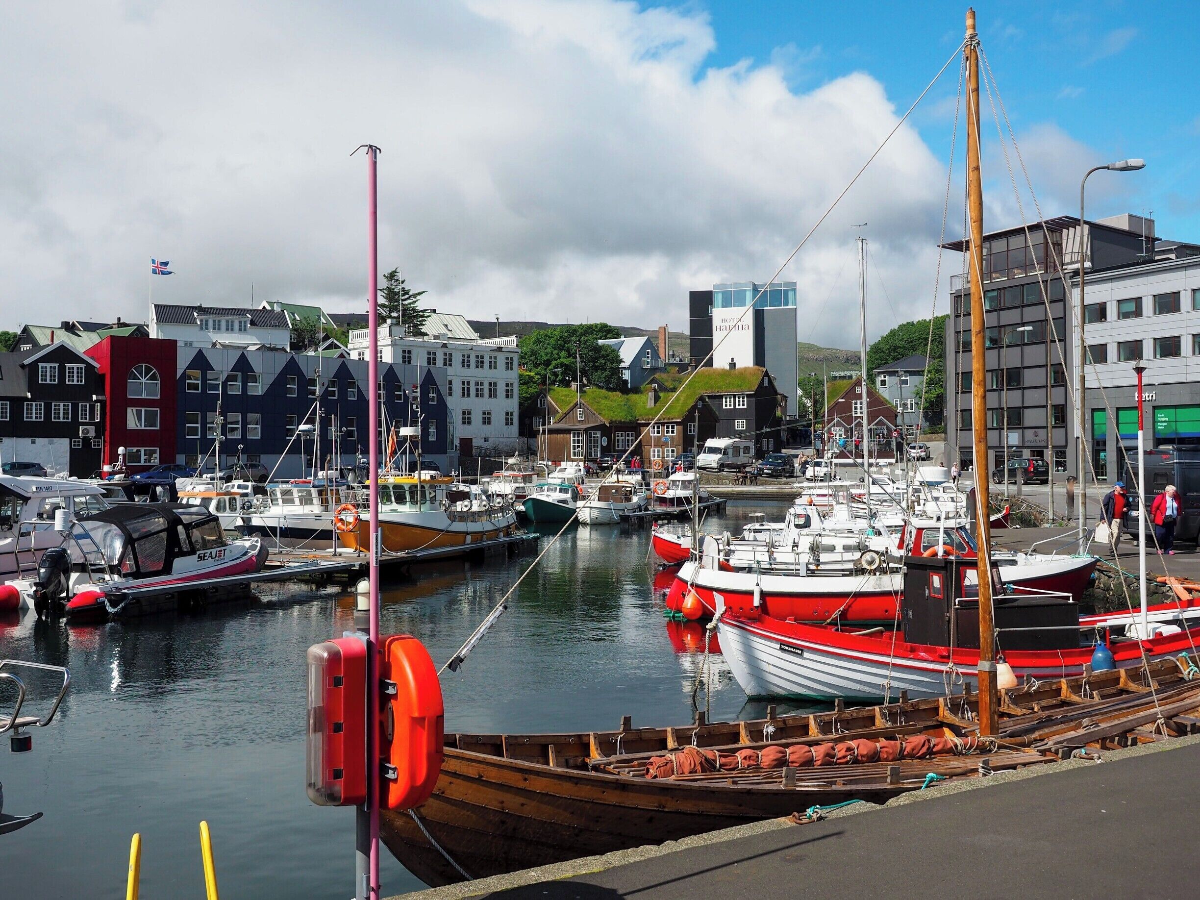 While in Torshavn, be sure to take a stroll along the harbor to see the mix of old and new in both buildings and boats.