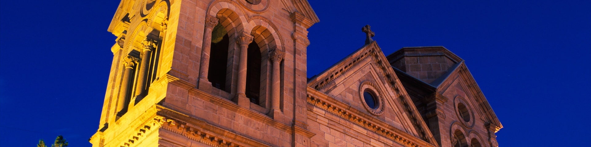 Cathedral Basilica of Saint Francis of Assisi featuring religious elements, a church or cathedral and night scenes