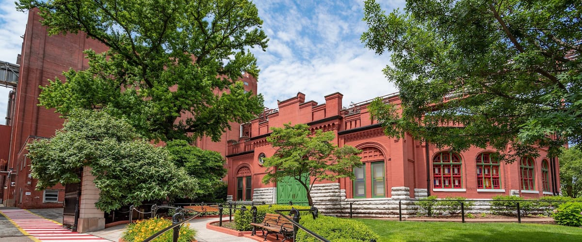 Anheuser-Busch Brewery featuring a park and heritage architecture