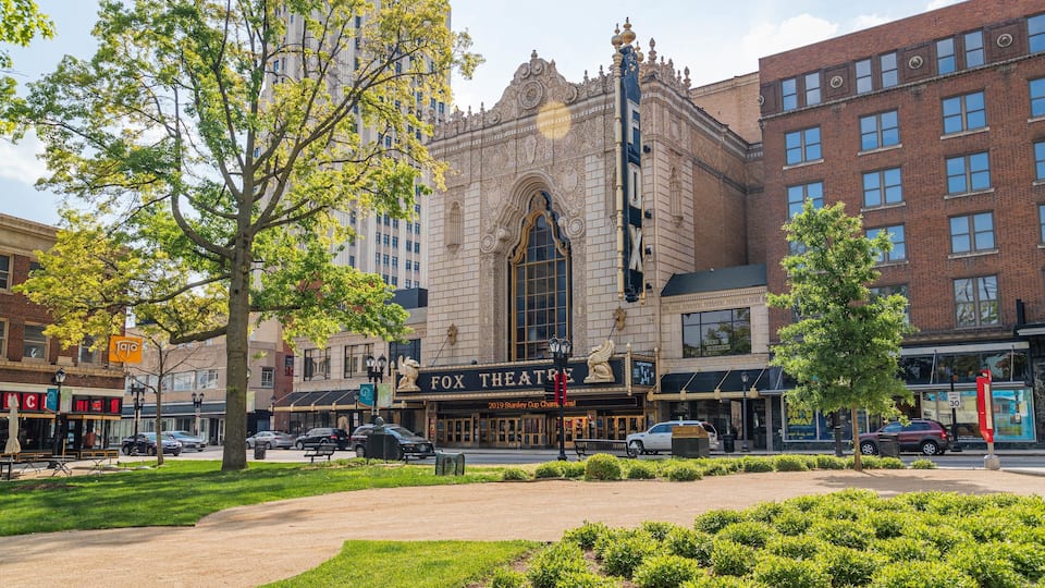 Fox Theater showing signage, a garden and a city