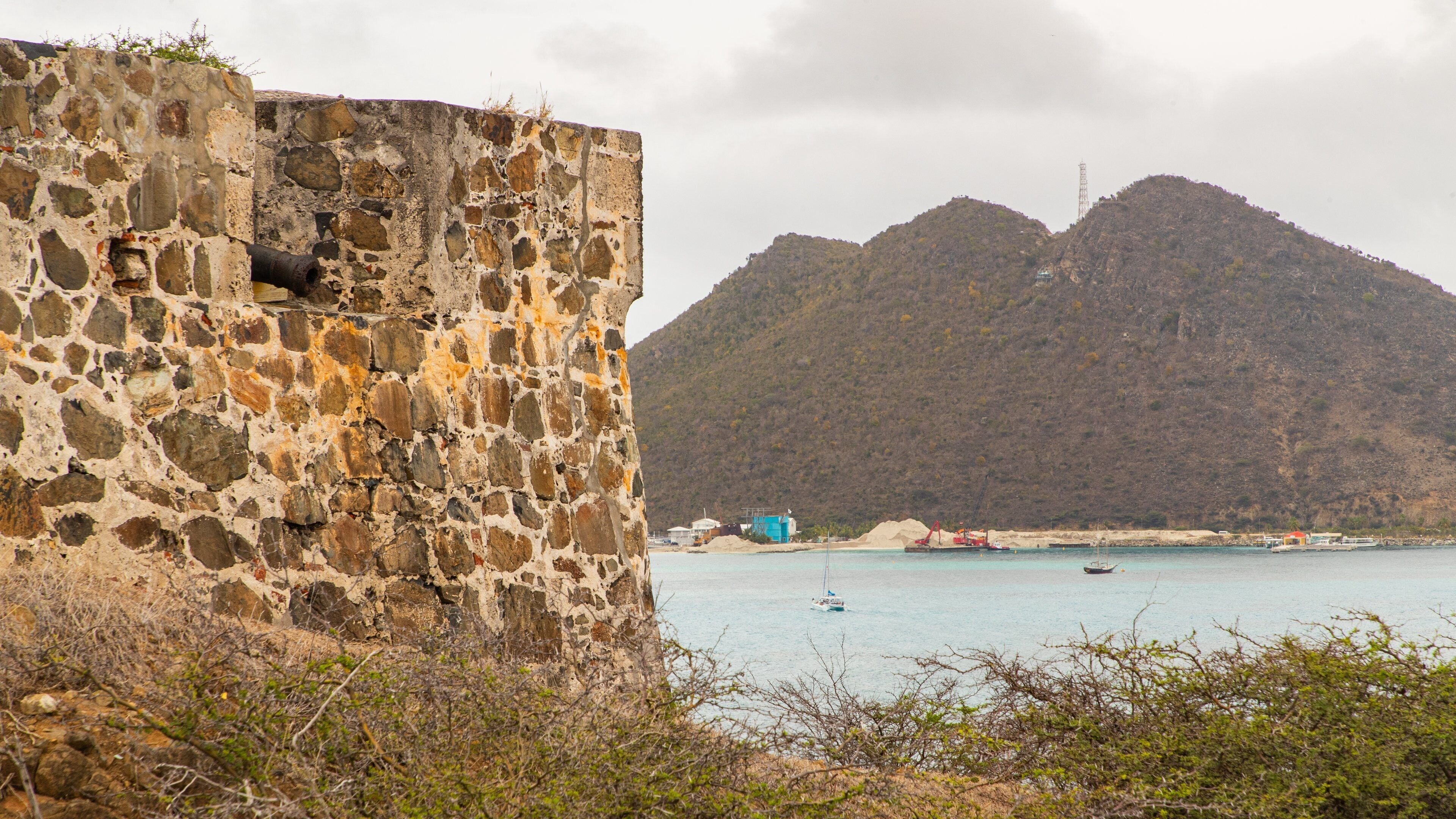 Fort Amsterdam which includes general coastal views and heritage elements