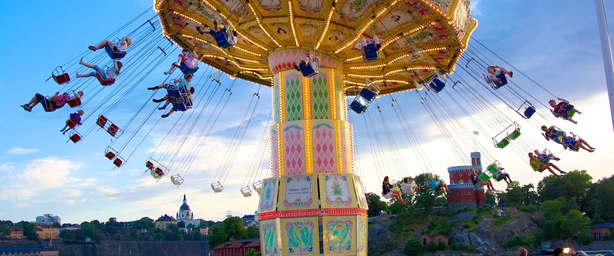 Tivoli Grona Lund showing rides as well as a large group of people