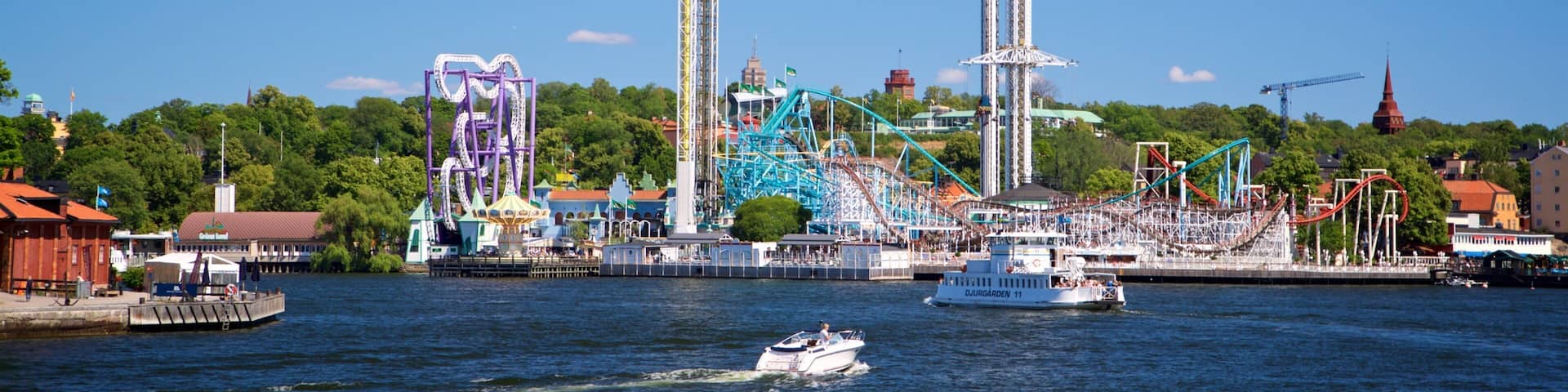 Tivoli Grona Lund featuring boating, a bay or harbor and rides