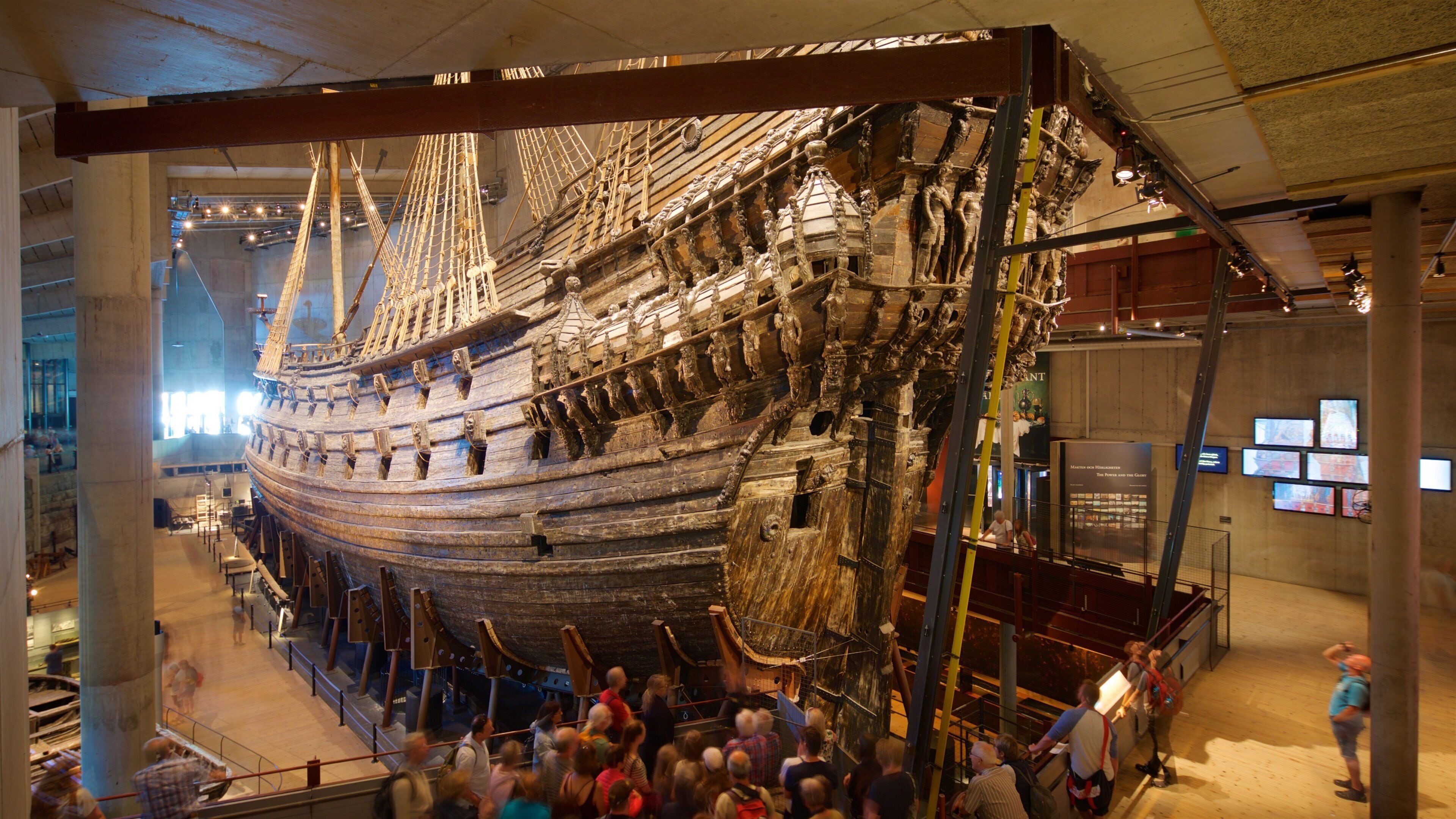 Vasa Museum featuring heritage elements and interior views as well as a small group of people