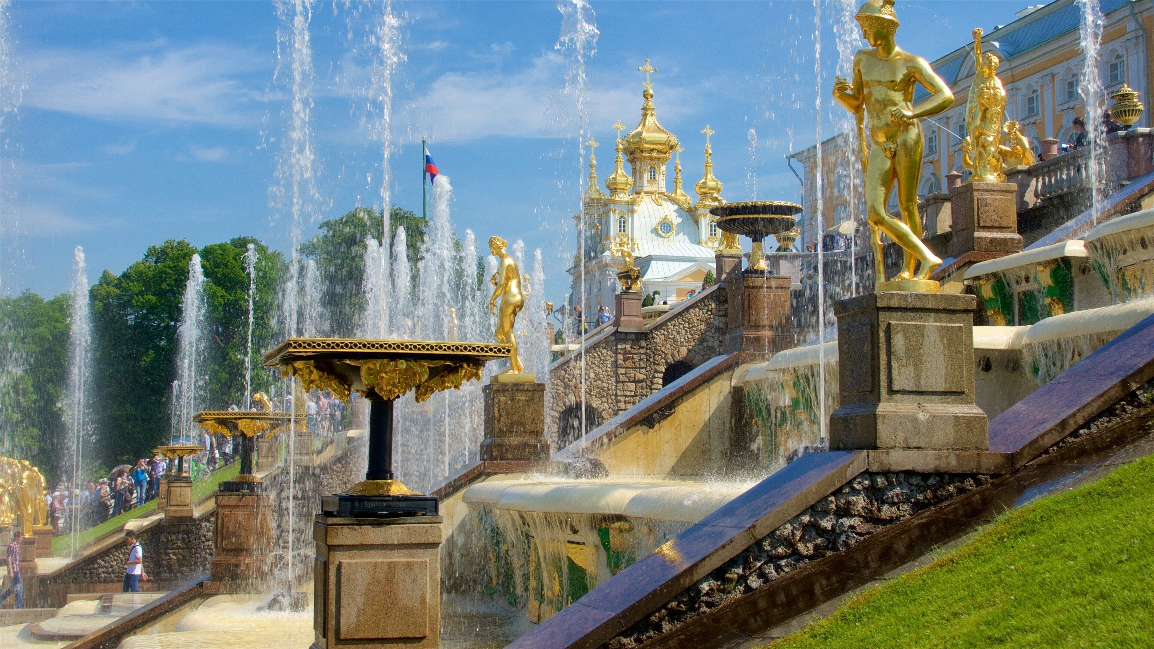 Peterhof Palace and Garden featuring a fountain and a garden