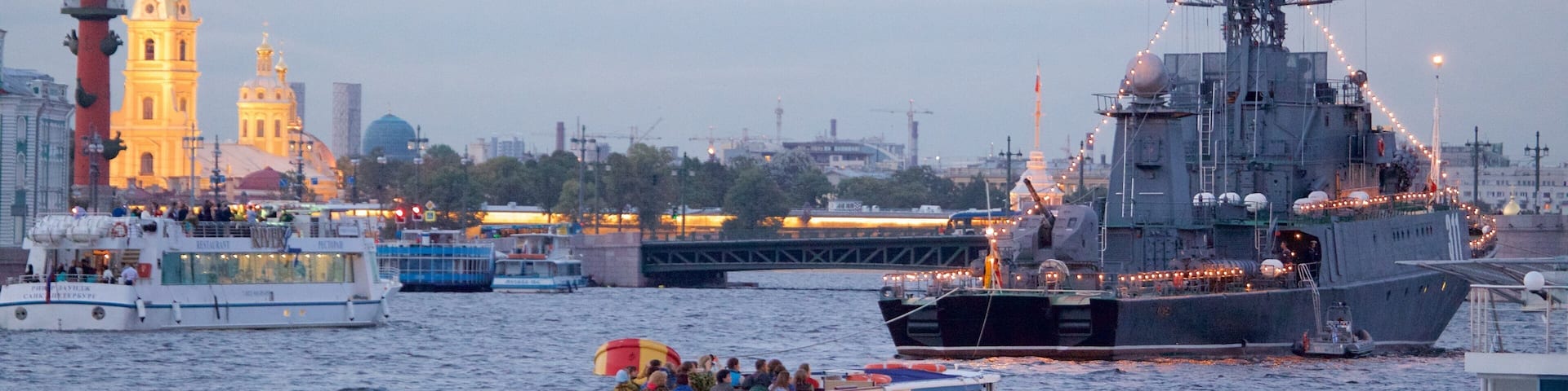 Peter and Paul Fortress showing a ferry and a river or creek