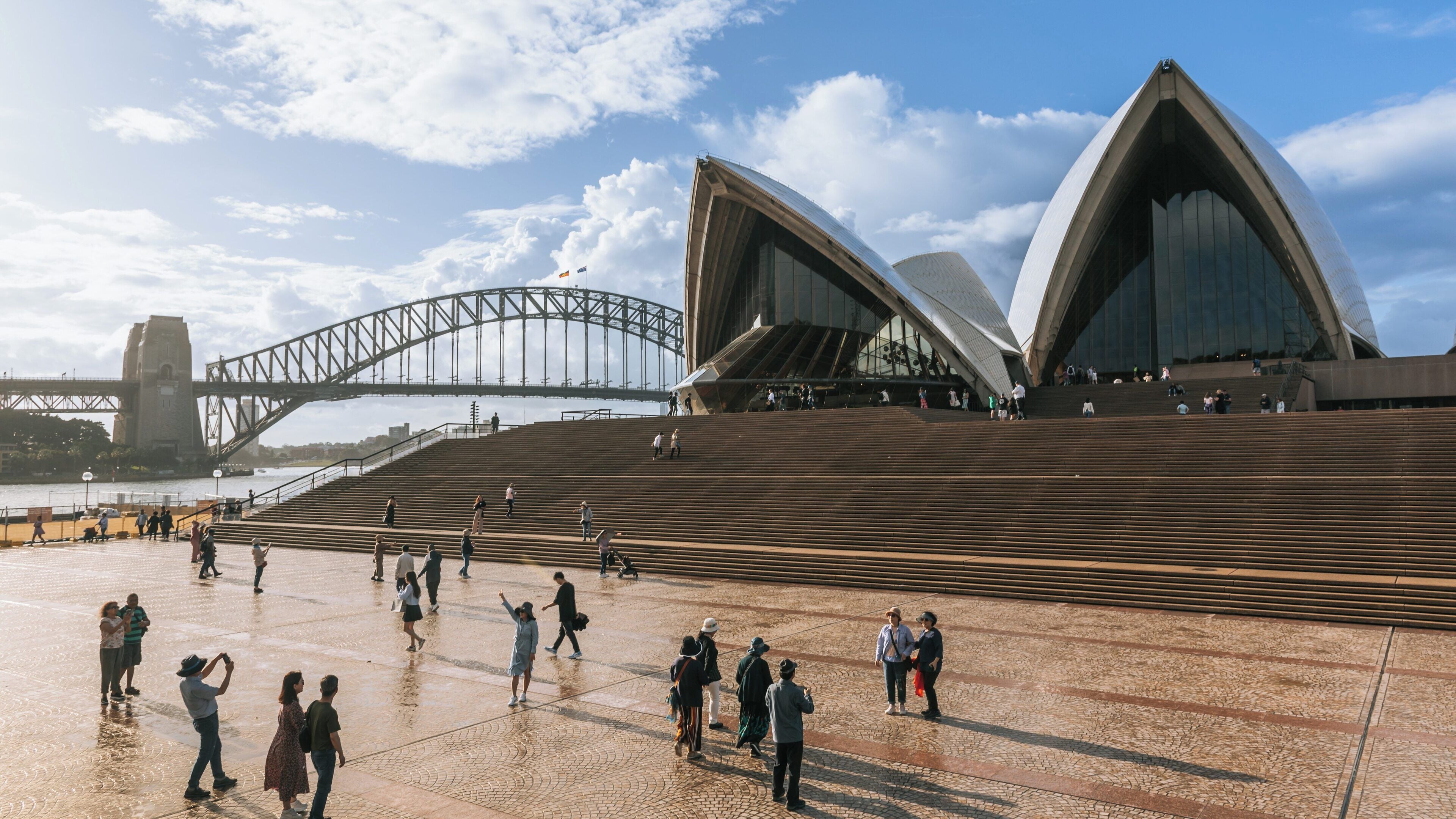 Visit to Circular Quay and The Rocks in Sydney showcasing cultural landmarks, waterfront views, and vibrant local activities during a sunny day