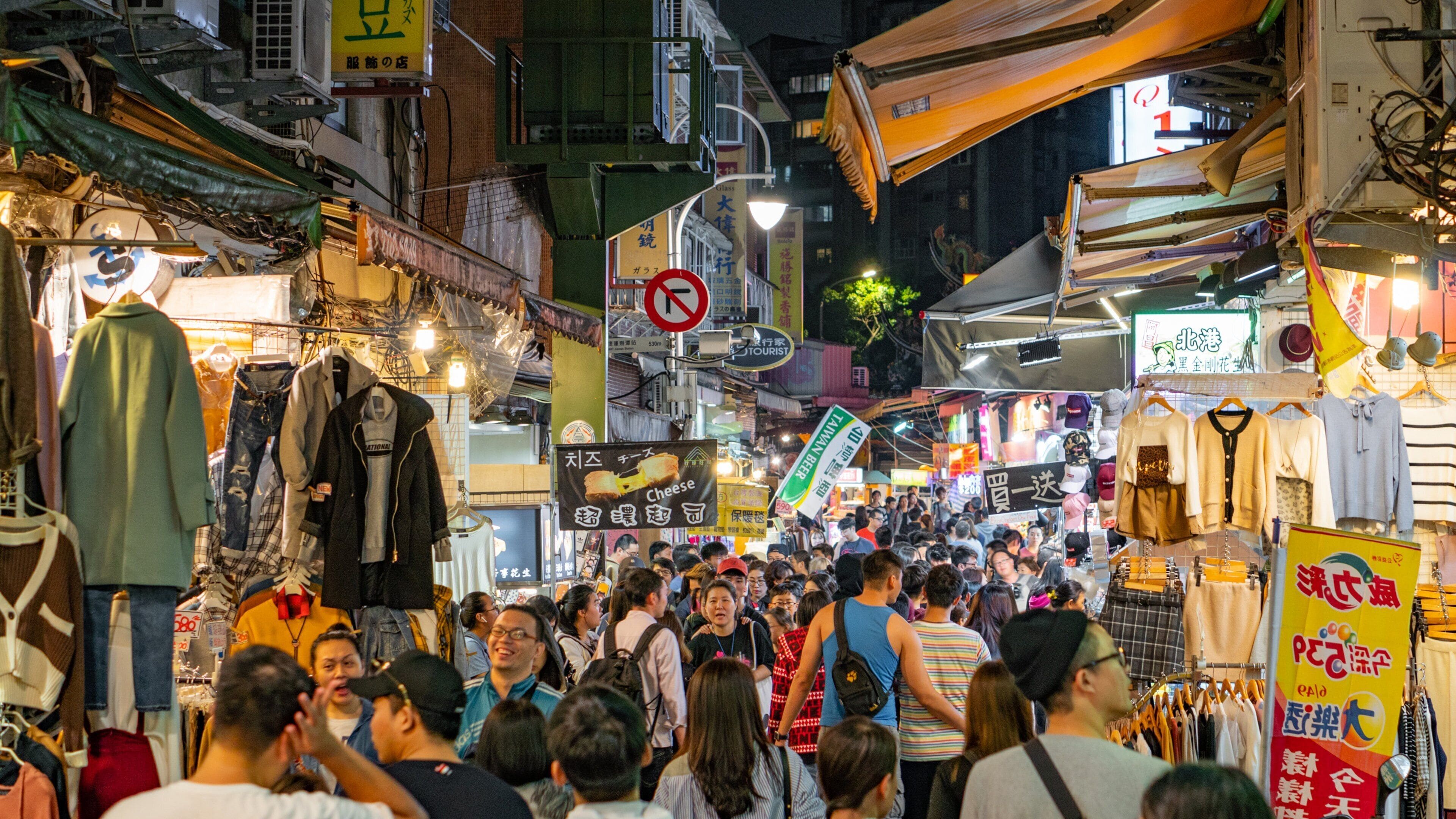 Shilin Night Market featuring night scenes, street scenes and markets