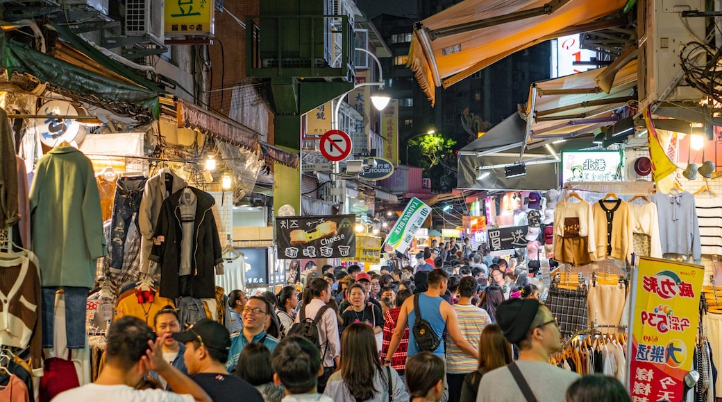 Shilin Night Market featuring night scenes, street scenes and markets
