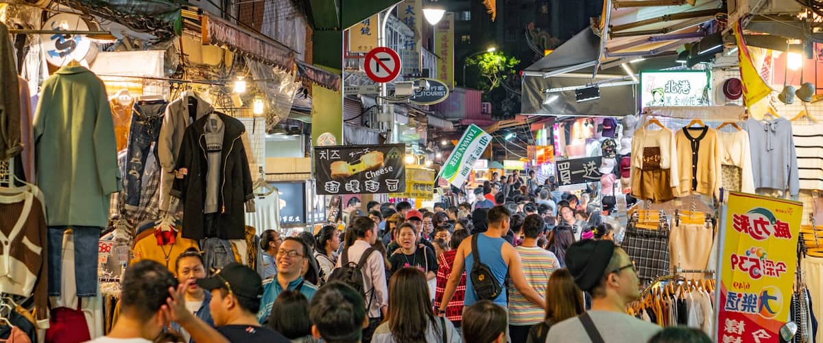 Shilin Night Market featuring night scenes, street scenes and markets