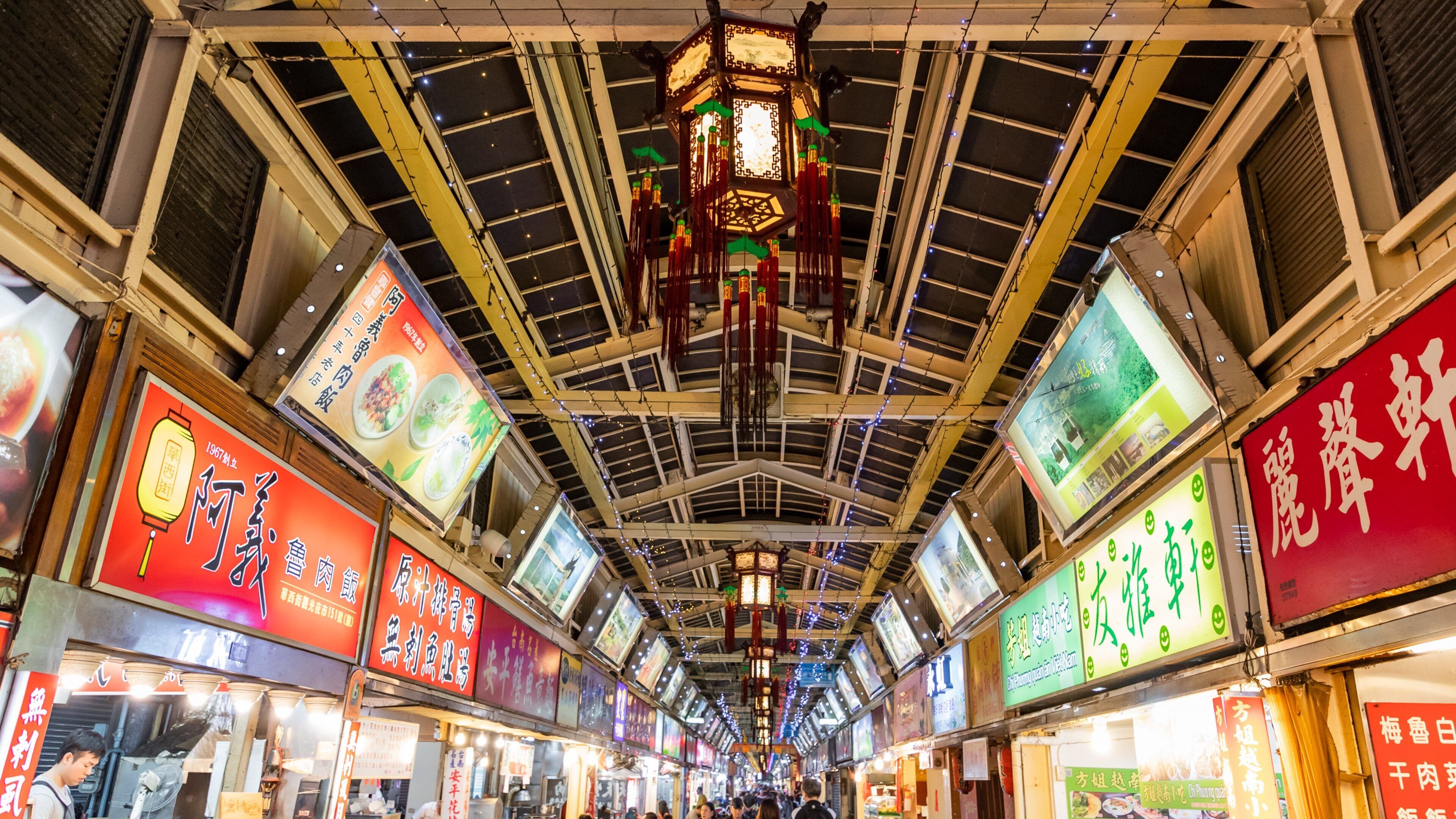 Huaxi Street Night Market showing interior views, markets and signage