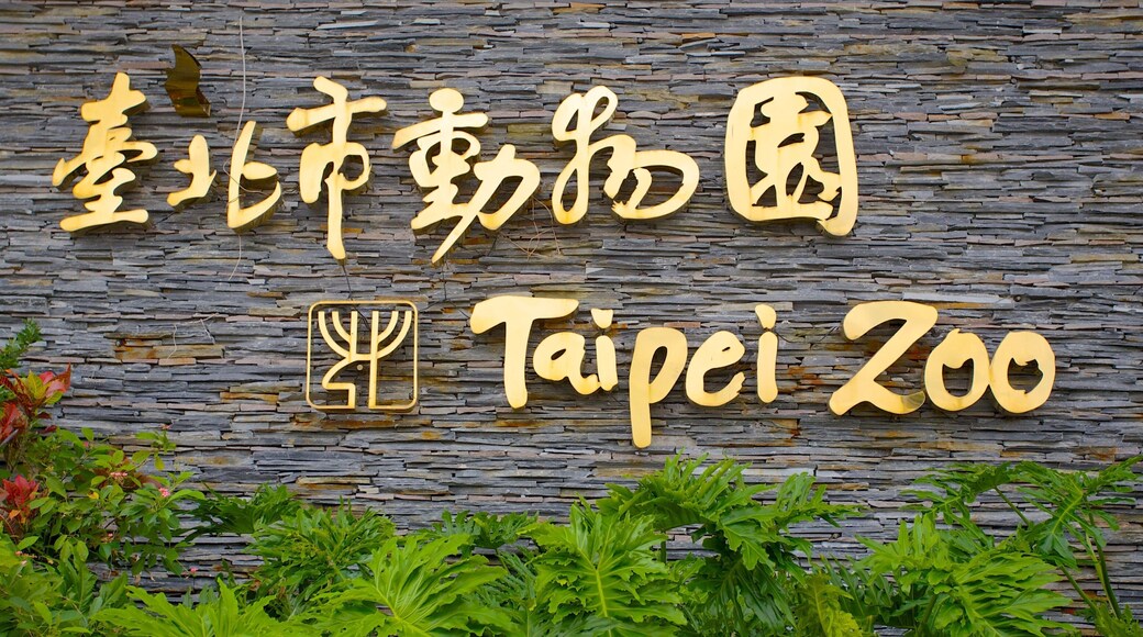 Taipei Zoo featuring zoo animals and signage