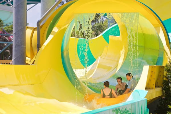 Adventure Island showing a waterpark as well as a small group of people