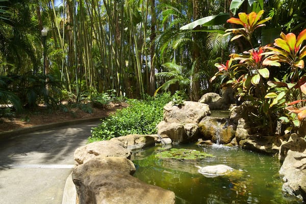 Sunken Gardens which includes a pond and a garden