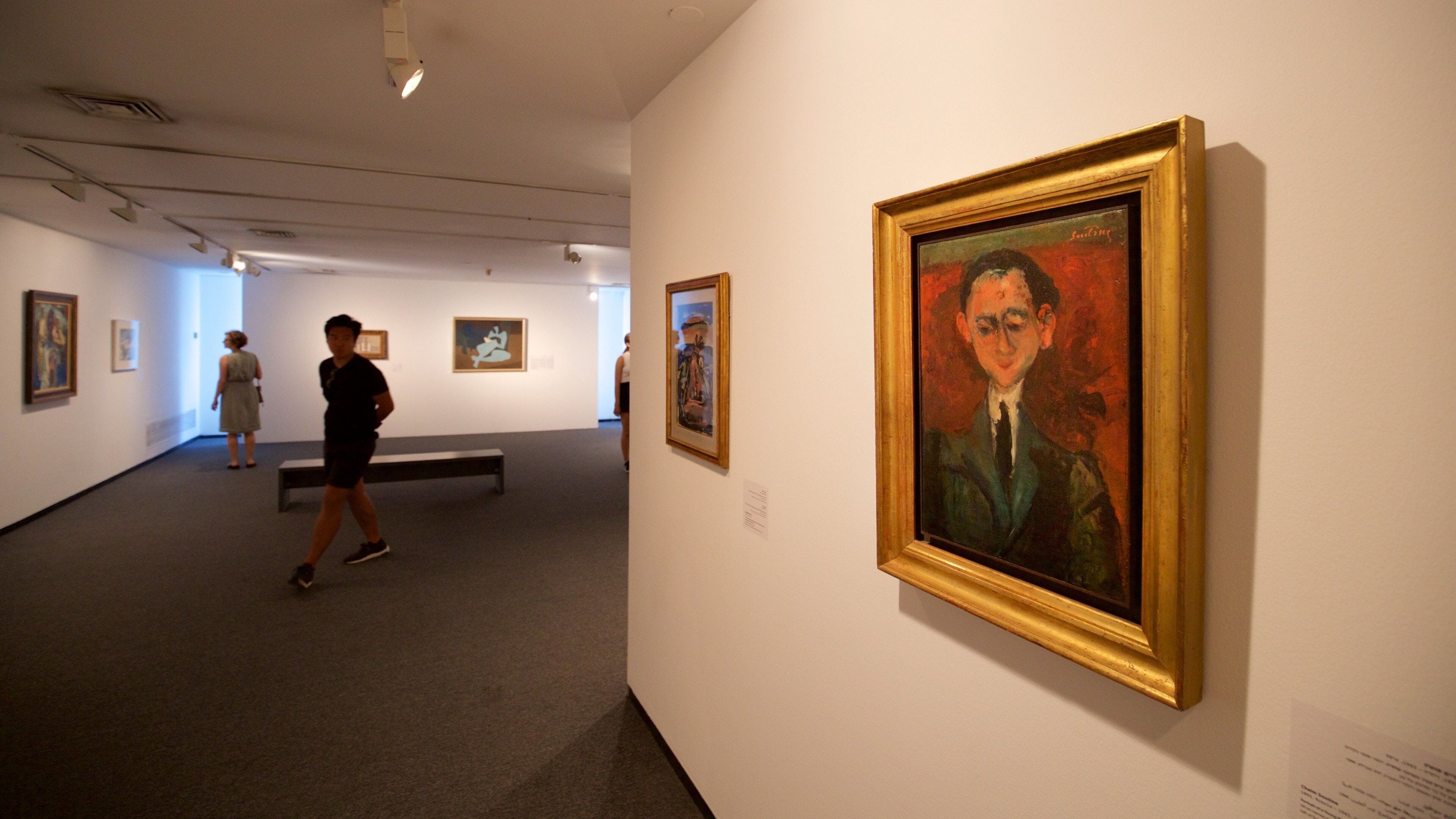 Tel Aviv Museum of Art which includes interior views and art as well as a small group of people