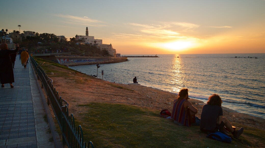 St. Peter\'s Church featuring a sunset and general coastal views as well as a couple