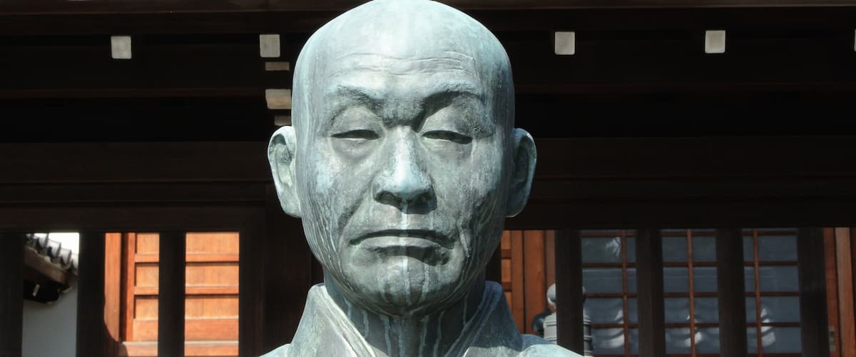 A statue of Sawaki Kodo Roshi - Zen Master at Sengaku-ji temple in Tokyo Japan near Shinagawa Station.; Shutterstock ID 170780858