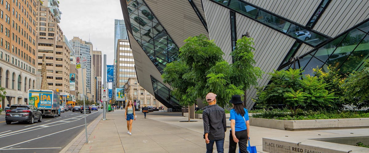 Royal Ontario Museum featuring street scenes, a city and modern architecture