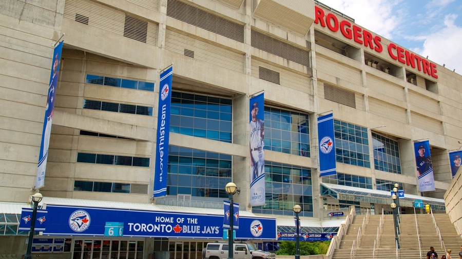 The Rogers Centre with the Toronto Blue Jays' home signage, multiple banners, and a clear view of the stadium entrance.