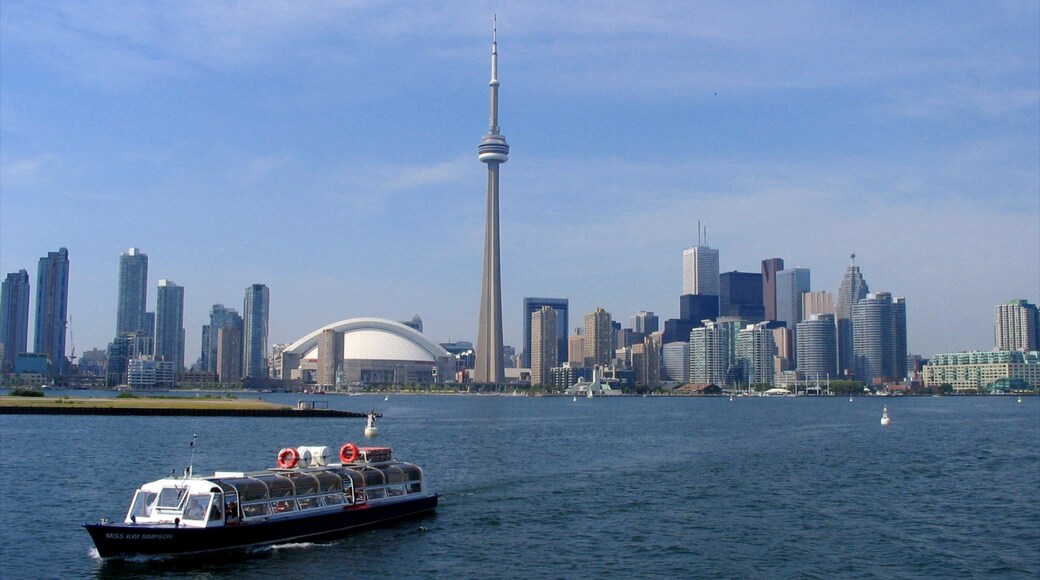 CN Tower showing a ferry, skyline and a city