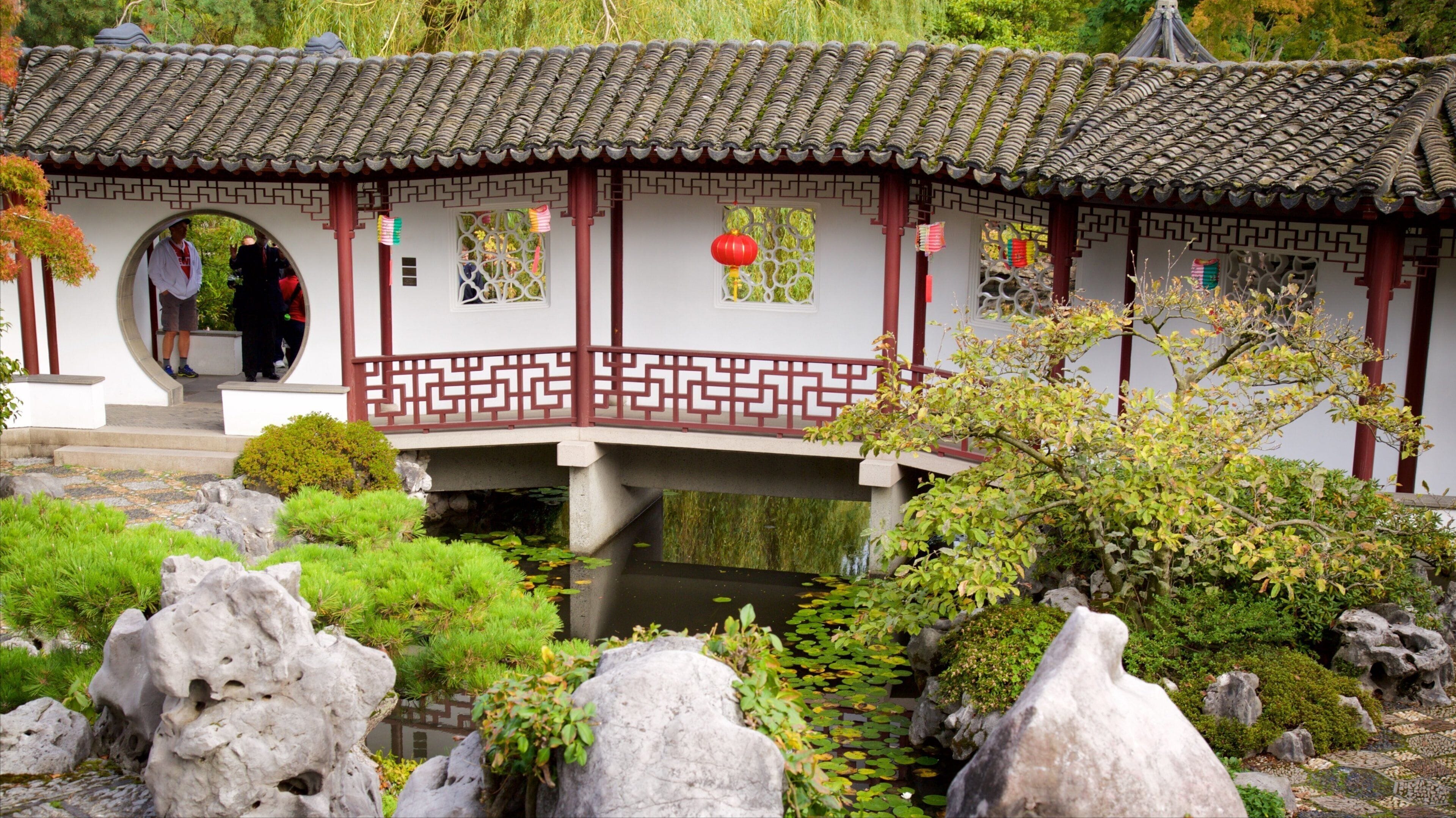 Dr. Sun Yat-Sen Classical Chinese Garden which includes a garden, a temple or place of worship and a pond
