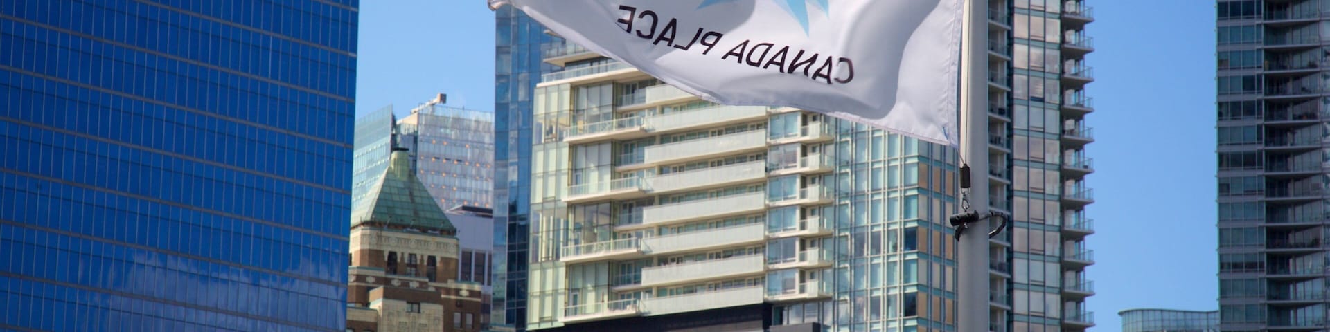 Canada Place which includes modern architecture, heritage architecture and a city