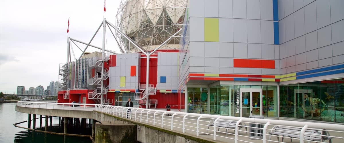 TELUS World of Science featuring modern architecture and a bay or harbour