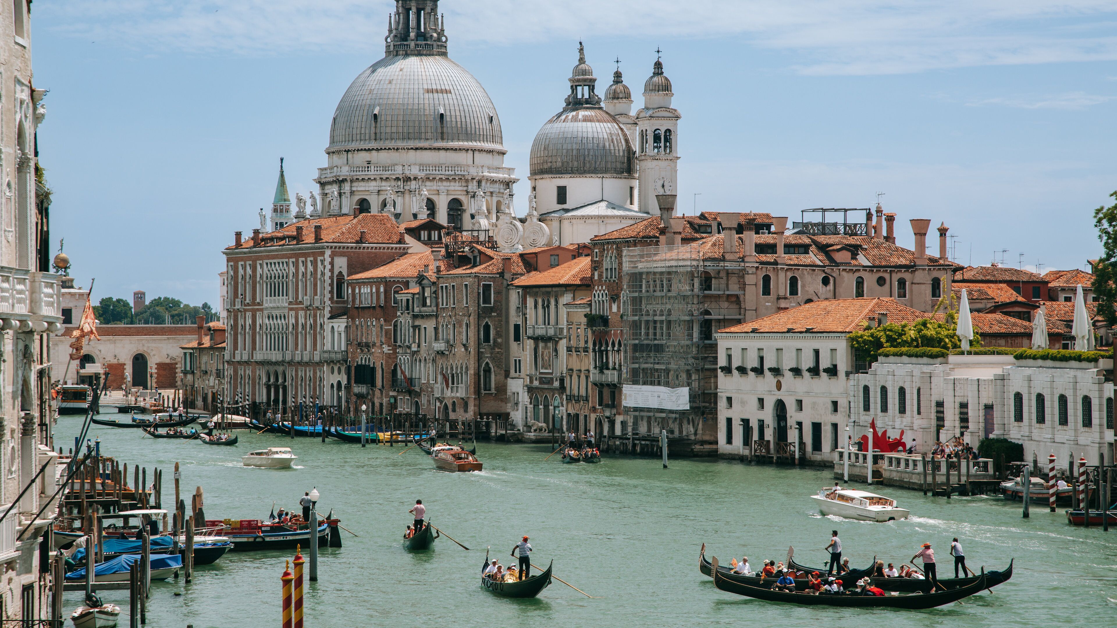 Teatro La Fenice featuring a city, kayaking or canoeing and a river or creek