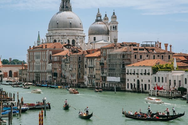 Teatro La Fenice featuring a city, kayaking or canoeing and a river or creek