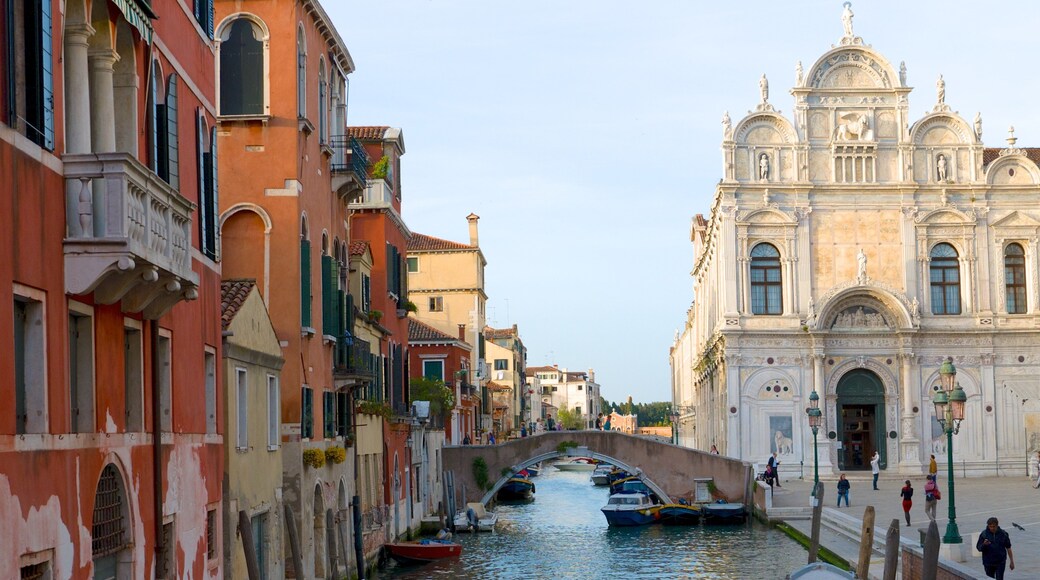 Chiesa Santa Maria dei Miracoli featuring street scenes, a church or cathedral and a river or creek