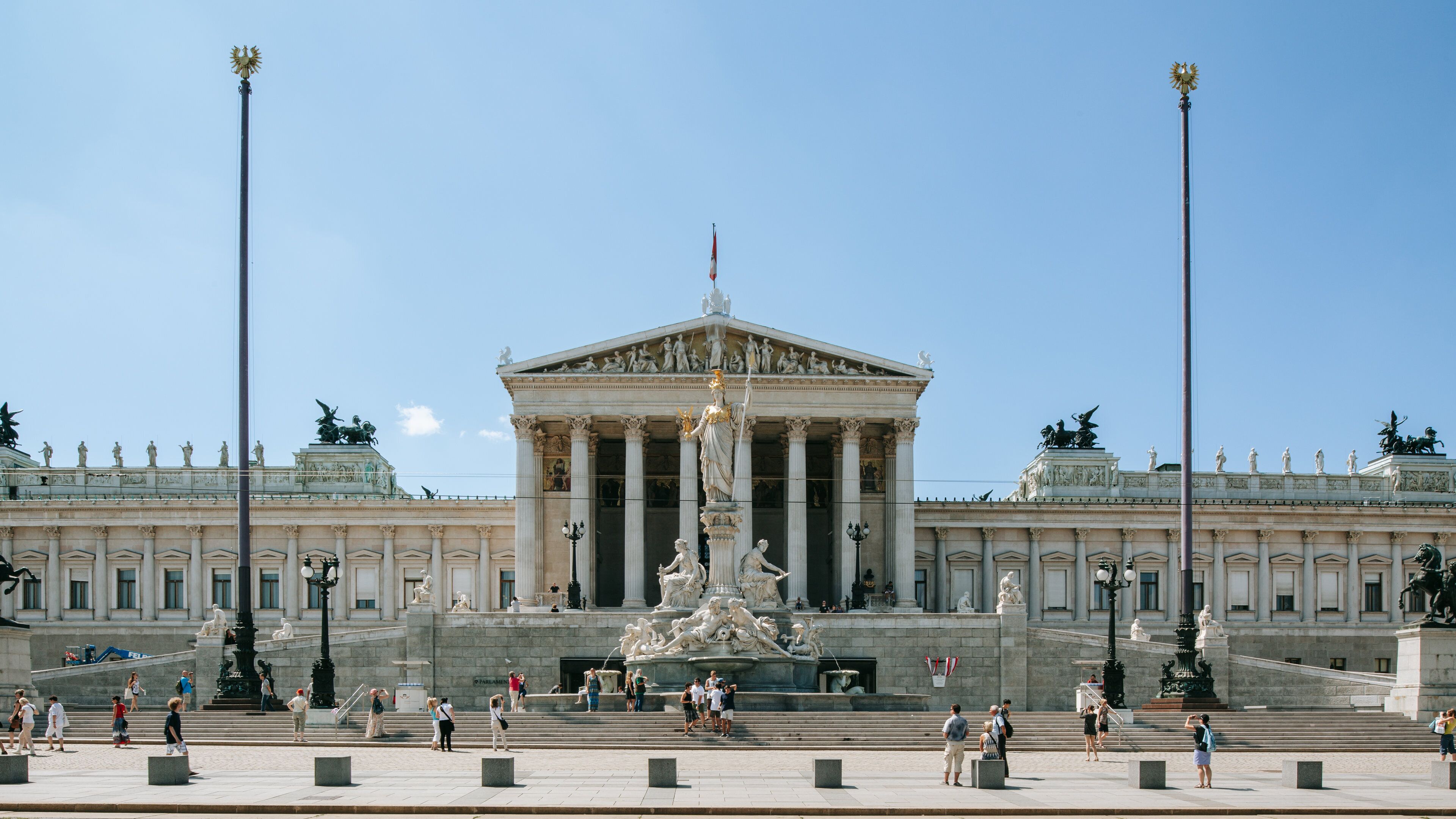 Austrian Parliament Building showing heritage architecture, a statue or sculpture and a square or plaza