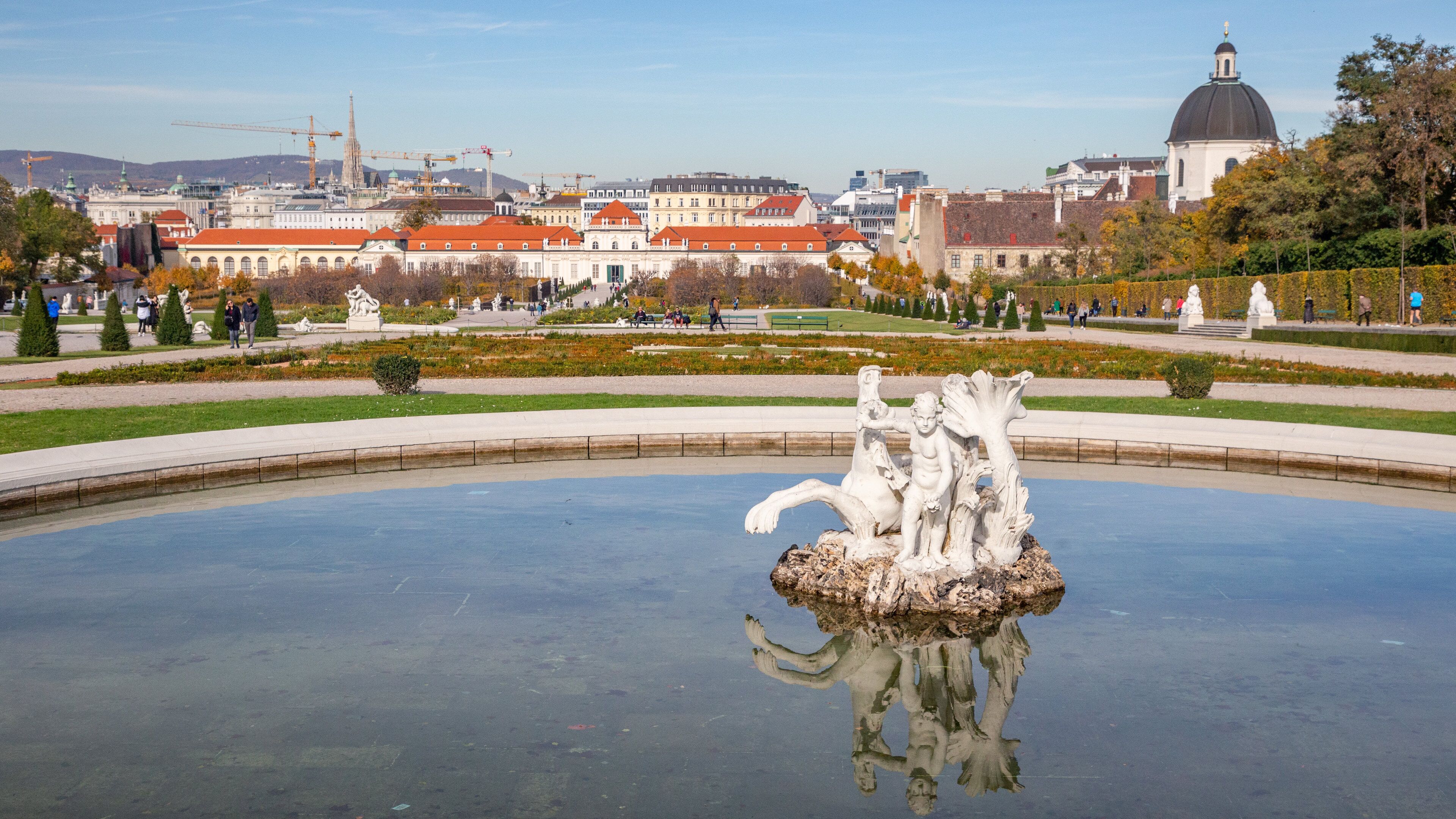 Belvedere which includes a pond and a statue or sculpture