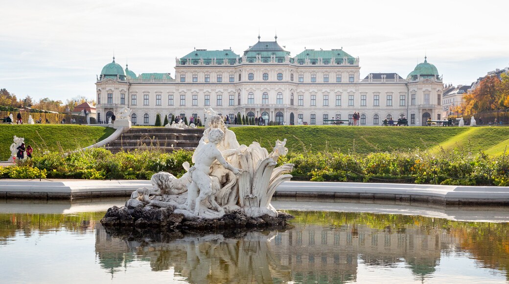 Belvedere featuring outdoor art, heritage architecture and a pond