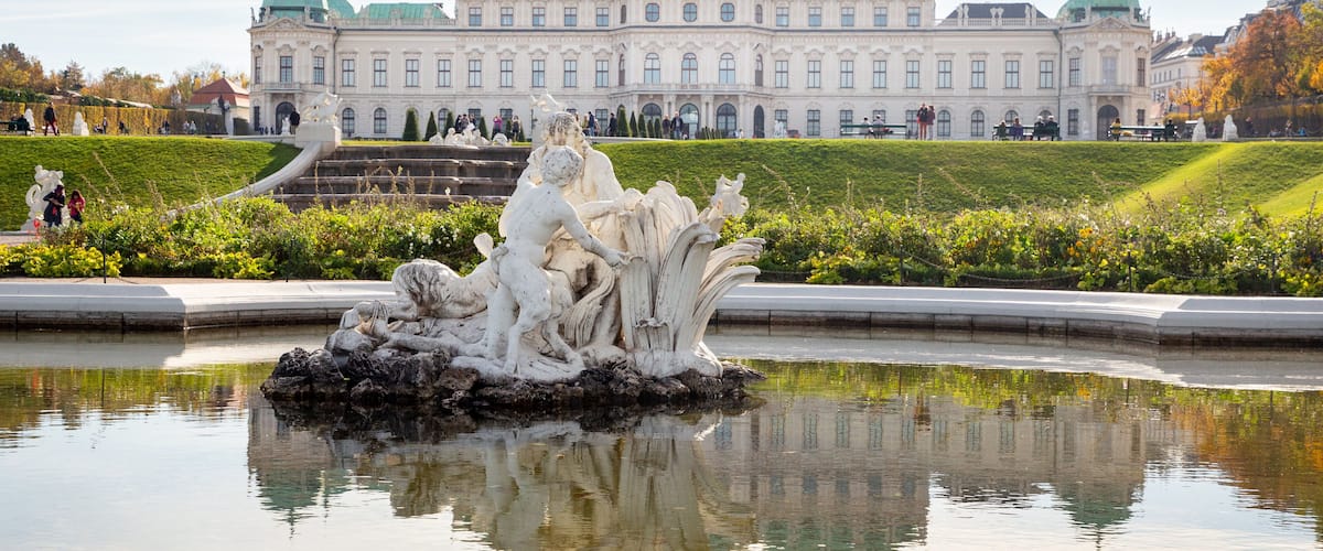 Belvedere featuring outdoor art, heritage architecture and a pond