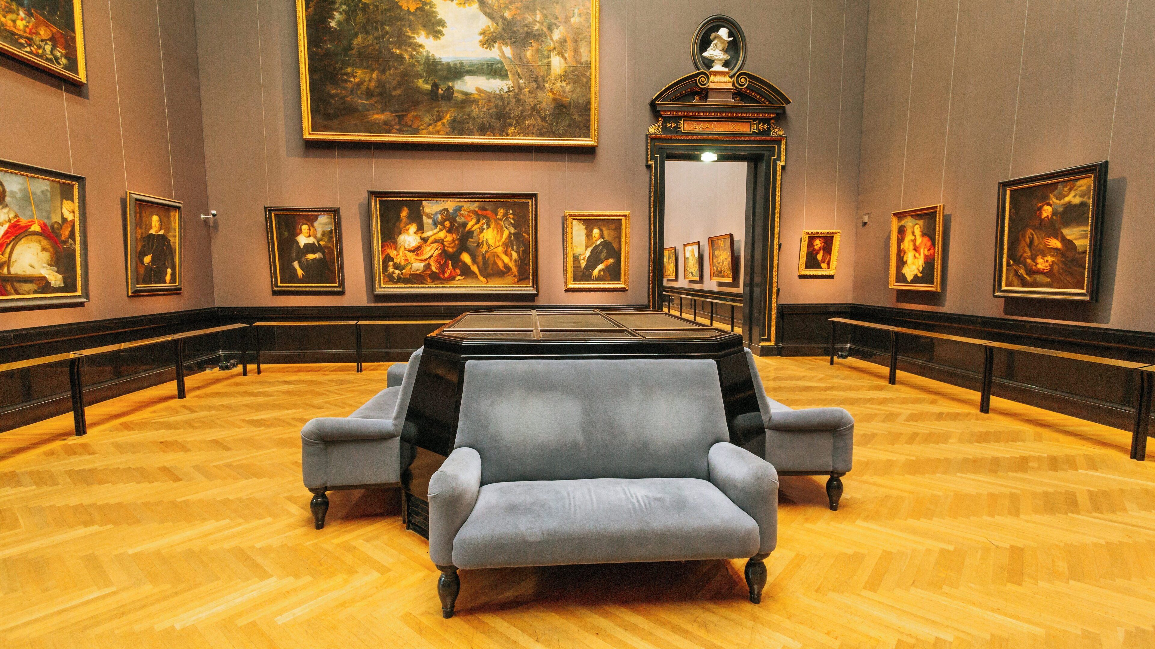 Exploring exquisite artworks at the Museum of Art History in Neubau, Vienna, Austria, showcasing famous paintings and elegant gallery design