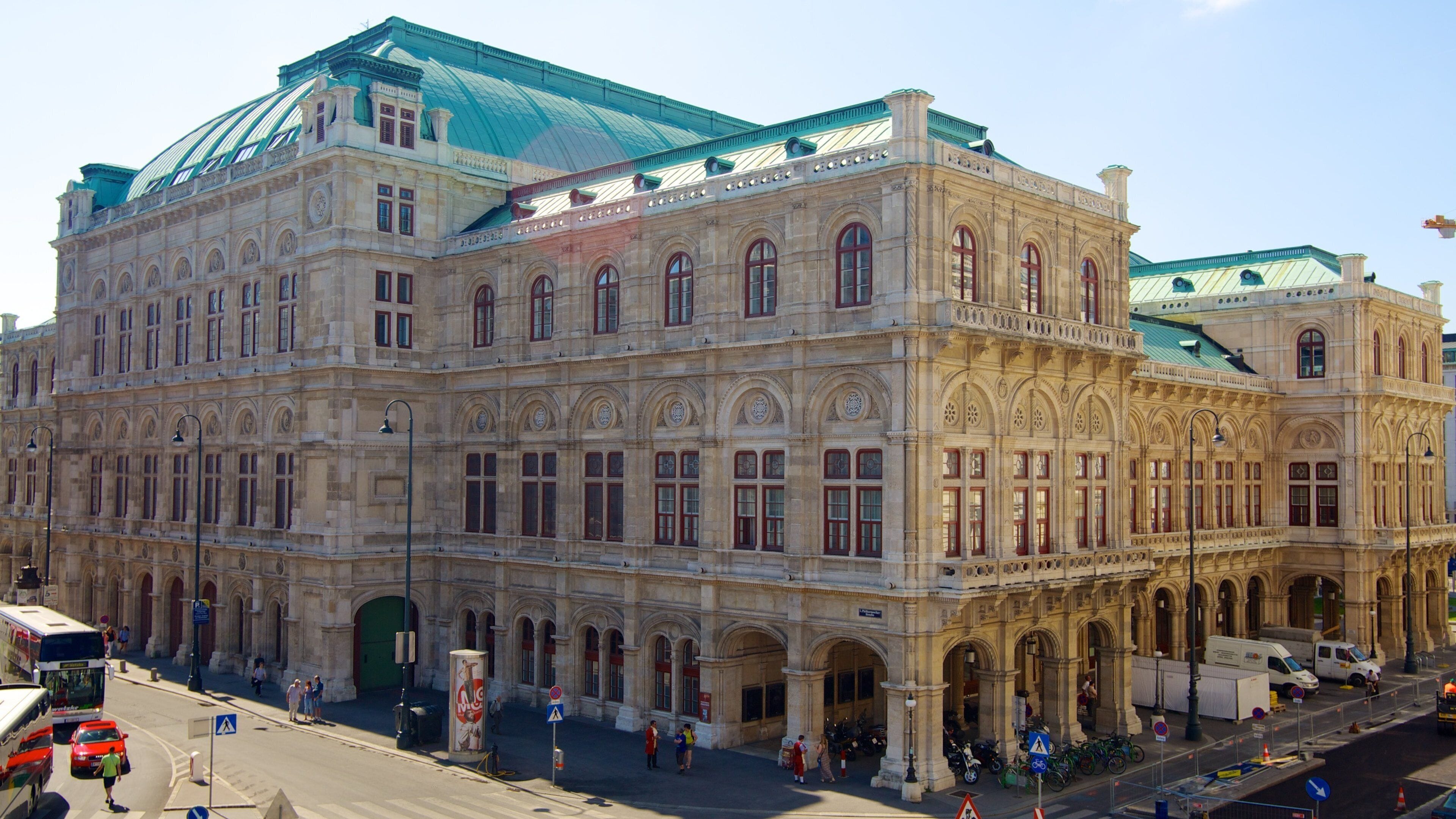Vienna State Opera featuring street scenes, a city and heritage architecture