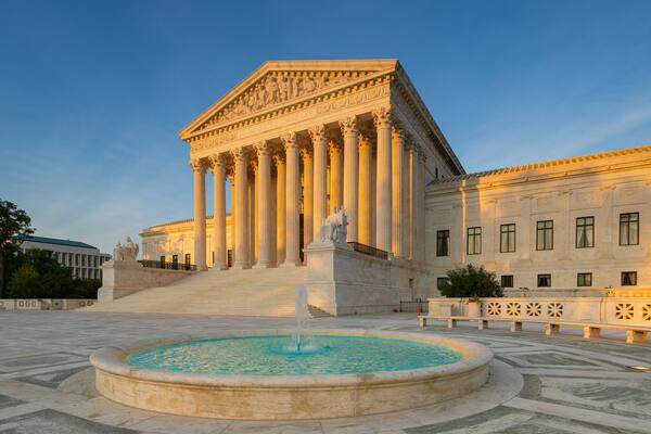 Supreme Court of the United States which includes a fountain, an administrative buidling and heritage architecture