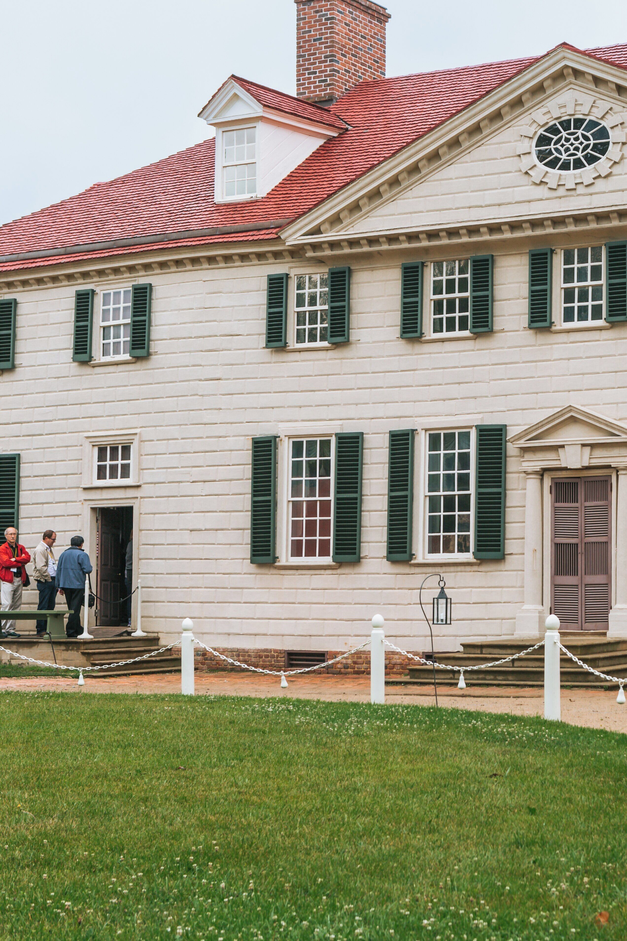 Exploring George Washington's Mount Vernon residence in Alexandria, Virginia with visitors enjoying the historical site