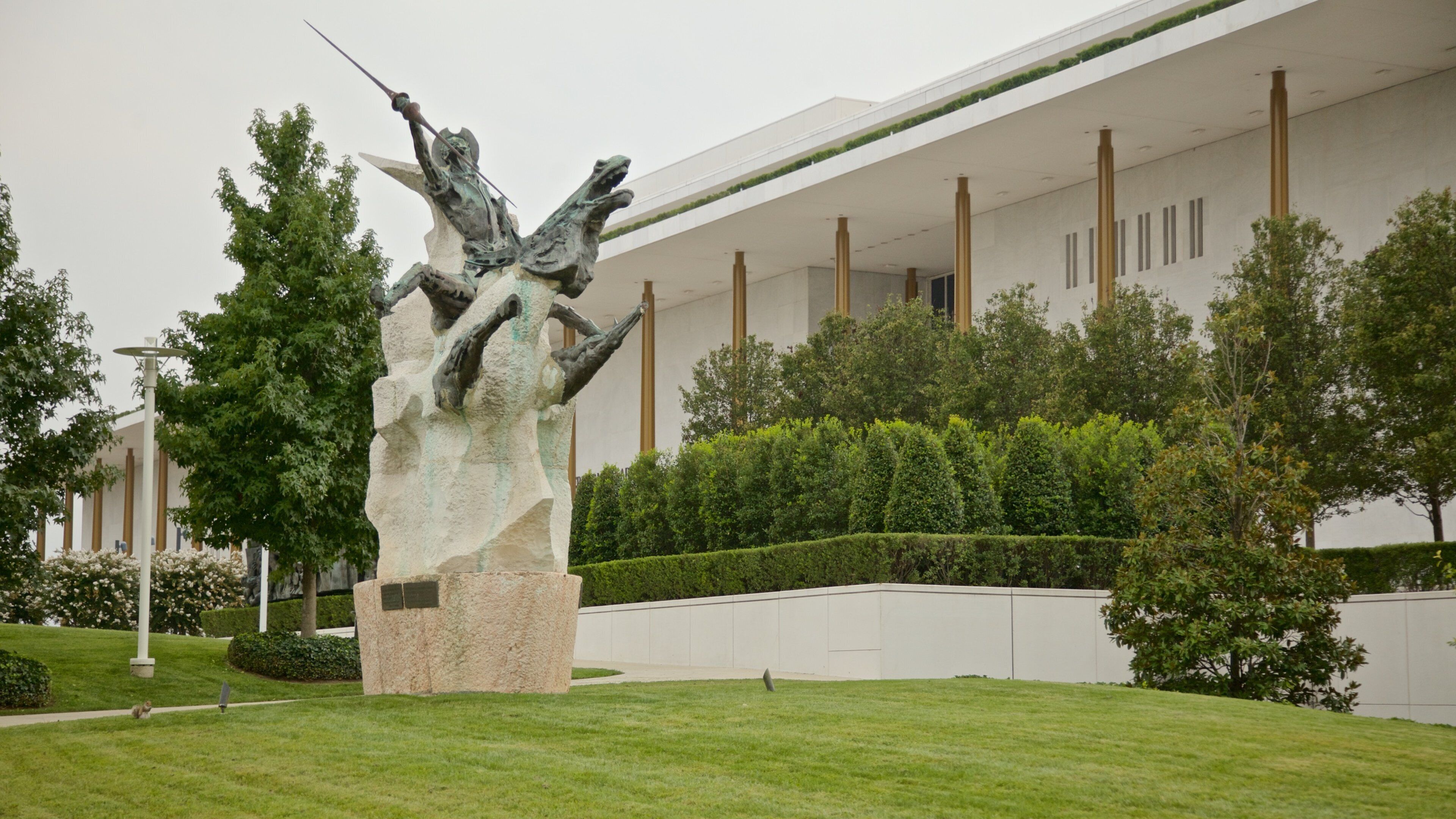 Kennedy Center showing a garden and outdoor art