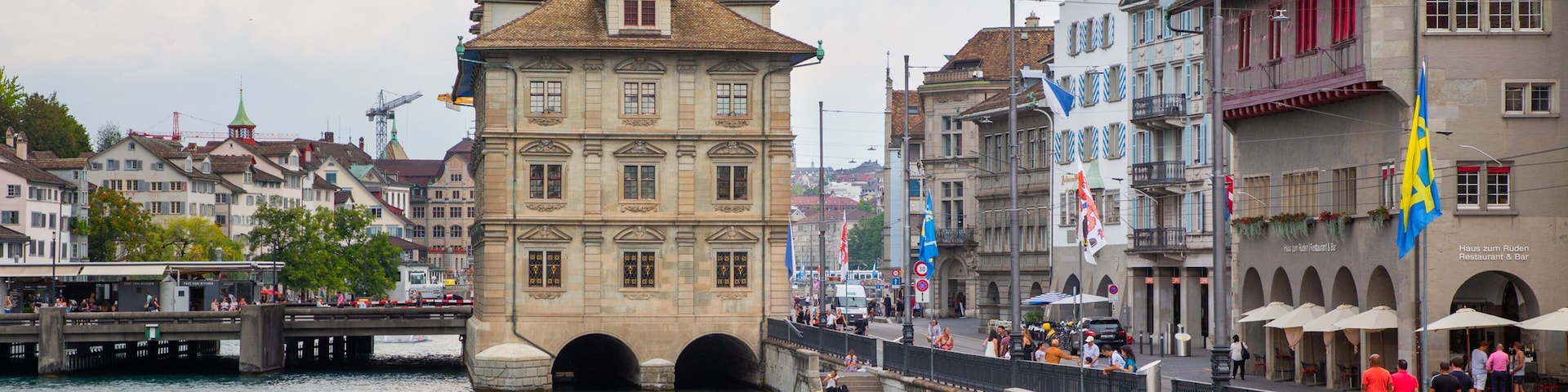 Zurich Town Hall featuring heritage elements and a bay or harbor
