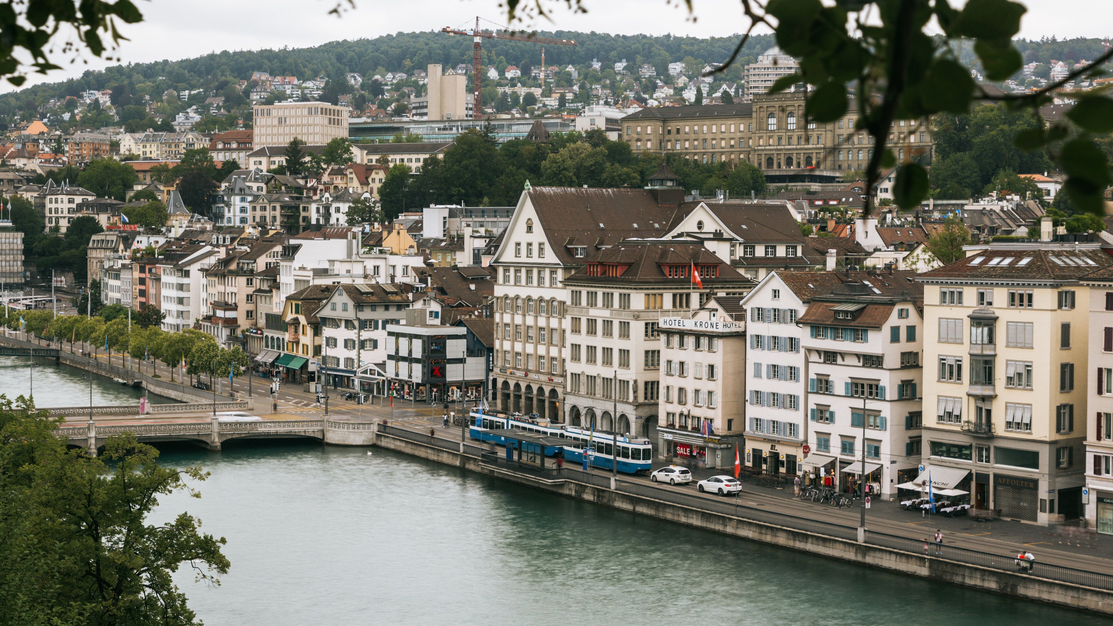 Lindenhof which includes a river or creek, a city and landscape views