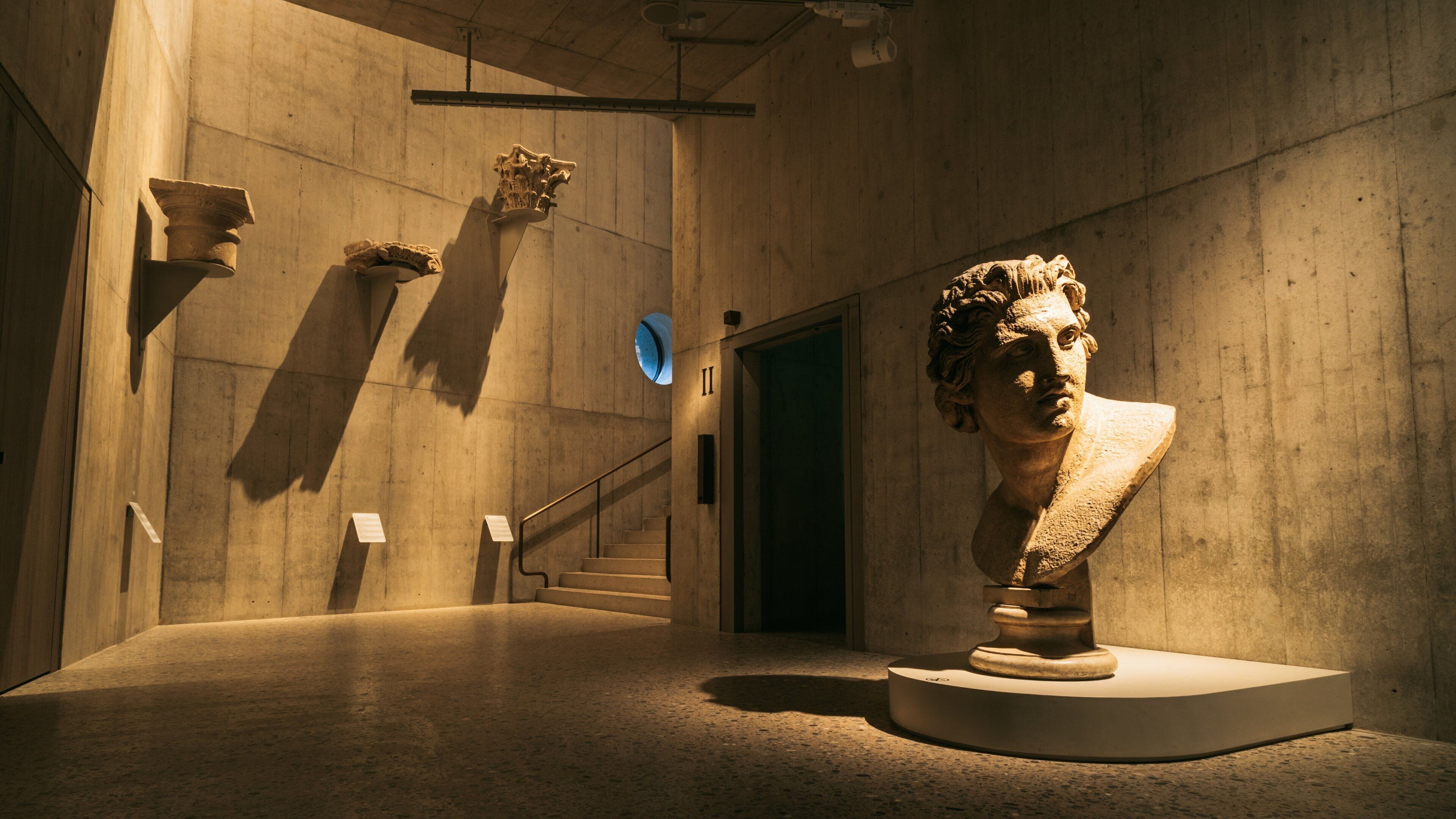 Swiss National Museum featuring a statue or sculpture, heritage elements and interior views