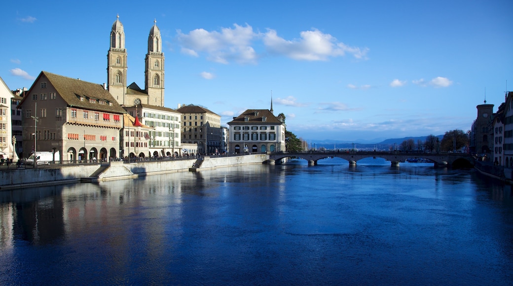 Grossmuenster which includes religious elements, a river or creek and a bridge